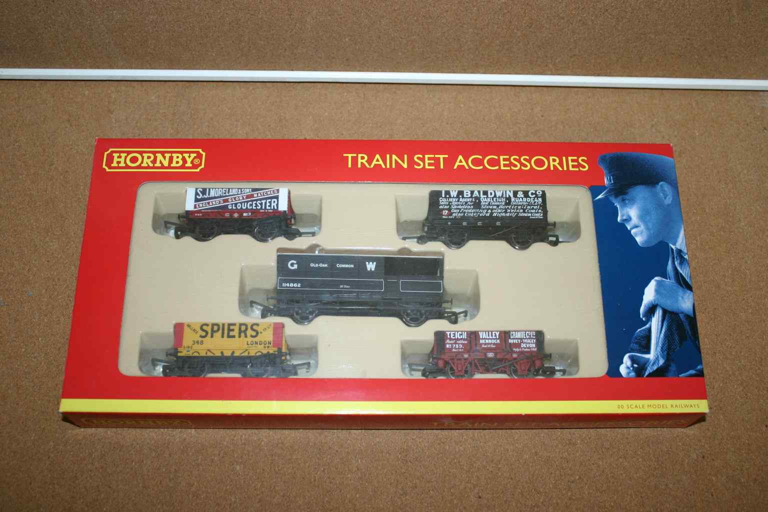 Hornby R6290 Wagons (Contains 1 x 7 plank, 2 x 6 plank, 1 x 4-plank & 1 x GWR 20T brake van) Pack of 5 Pre-Owned 1 Hornby R6290 Wagons (Contains 1 x 7 plank, 2 x 6 plank, 1 x 4-plank & 1 x GWR 20T brake van) Pack of 5 Pre-Owned